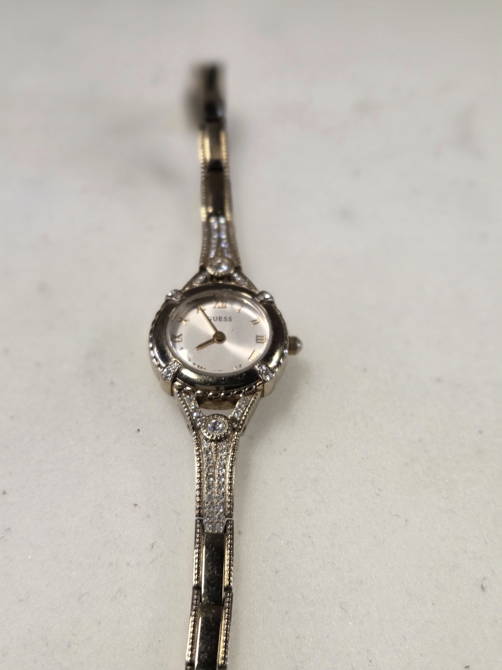 Guess Women’s Silver-Tone Crystal Accent Bracelet Watch